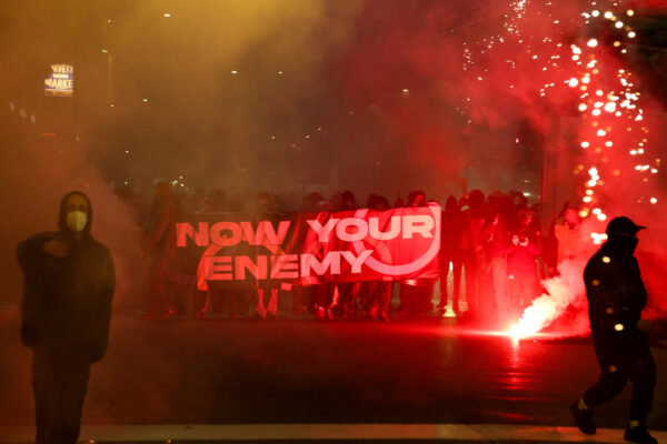 Demonstrators protest the 2026 Winter Olympics in Milan