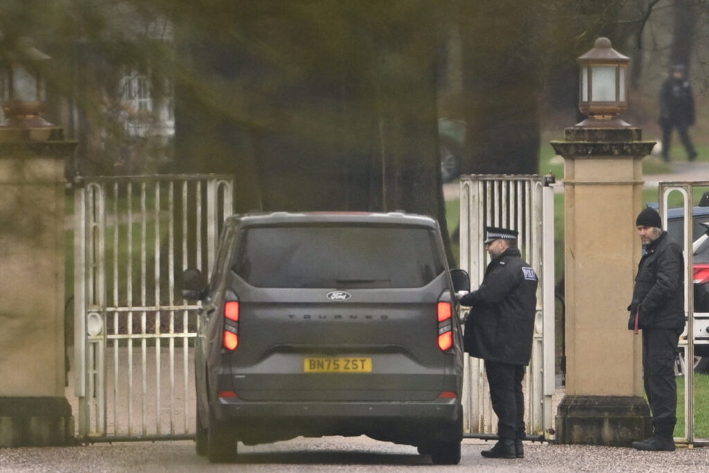 Police vehicles are parked outside Royal Lodge, amid a report of an arrest, in Windsor