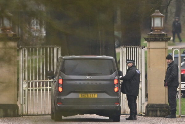 Police vehicles are parked outside Royal Lodge, amid a report of an arrest, in Windsor