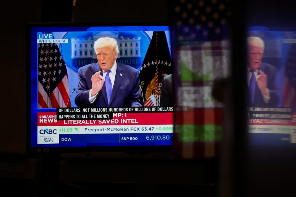 Traders react to Supreme Court’s ruling on tariffs, on the floor of the NYSE in New York