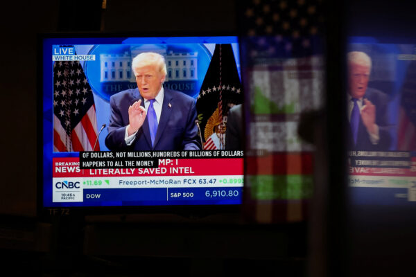 Traders react to Supreme Court’s ruling on tariffs, on the floor of the NYSE in New York