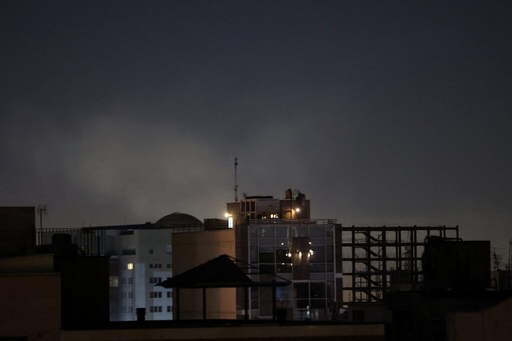 Smoke rises following an explosion, after Israel and the U.S. launched strikes on Iran, in Tehran