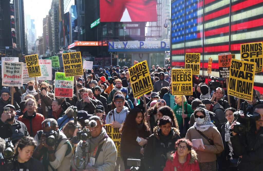 People attend a protest against U.S. and Israel strikes against Iran, in the Manhattan borough of New York City