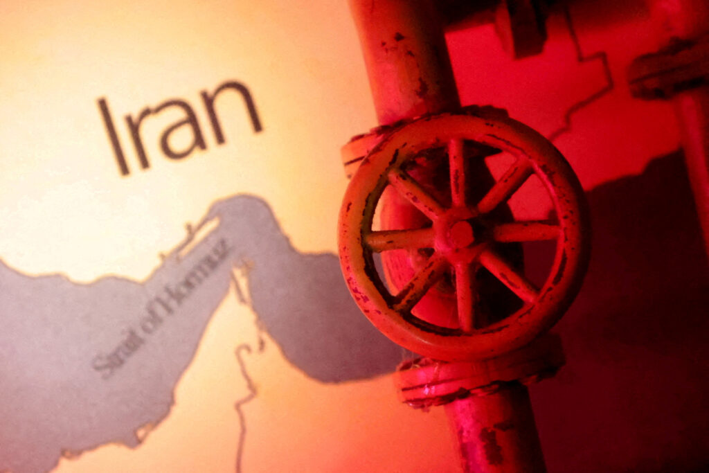 FILE PHOTO: Illustration shows map showing the Strait of Hormuz, Iran and 3D printed oil pipeline