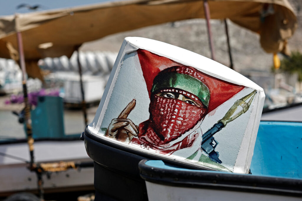 A drawing representing Hamas’s military is stuck on the engine of a boat on Haramil Beach