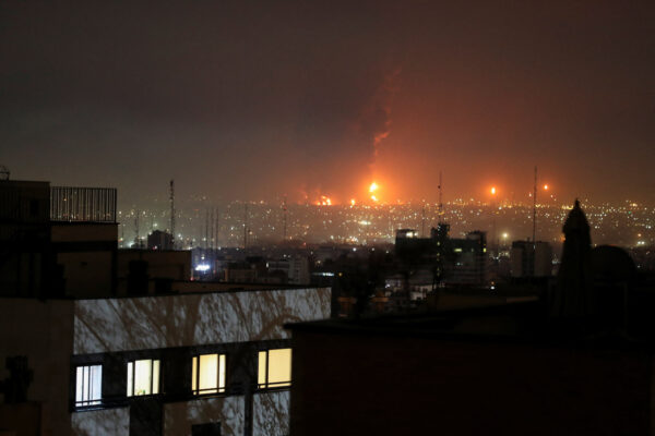 Smoke rises following an explosion, amid the U.S.-Israeli conflict with Iran, in Tehran