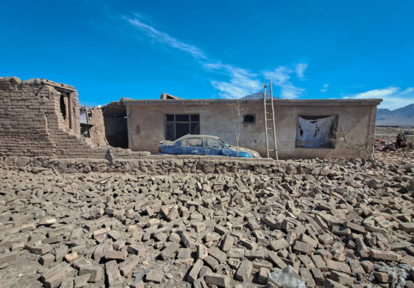 A car stands outside a house damaged in what the Taliban said was a Pakistani air strike on the outskirts of Kabul