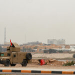 An Iraqi army Humvee stands guard near the U.S. Embassy, in Baghdad