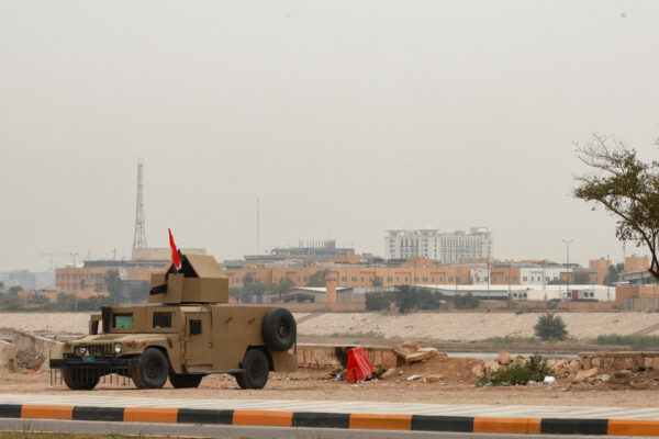 An Iraqi army Humvee stands guard near the U.S. Embassy, in Baghdad