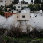 Israeli army demolishes a Palestinian house, in Dura, in the Israeli-occupied West Bank
