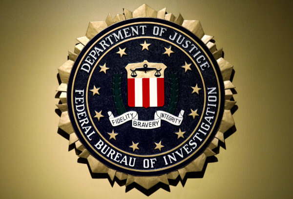 The Federal Bureau of Investigation seal is seen at FBI headquarters before a news conference by the FBI Director the inspector general’s report in Washington