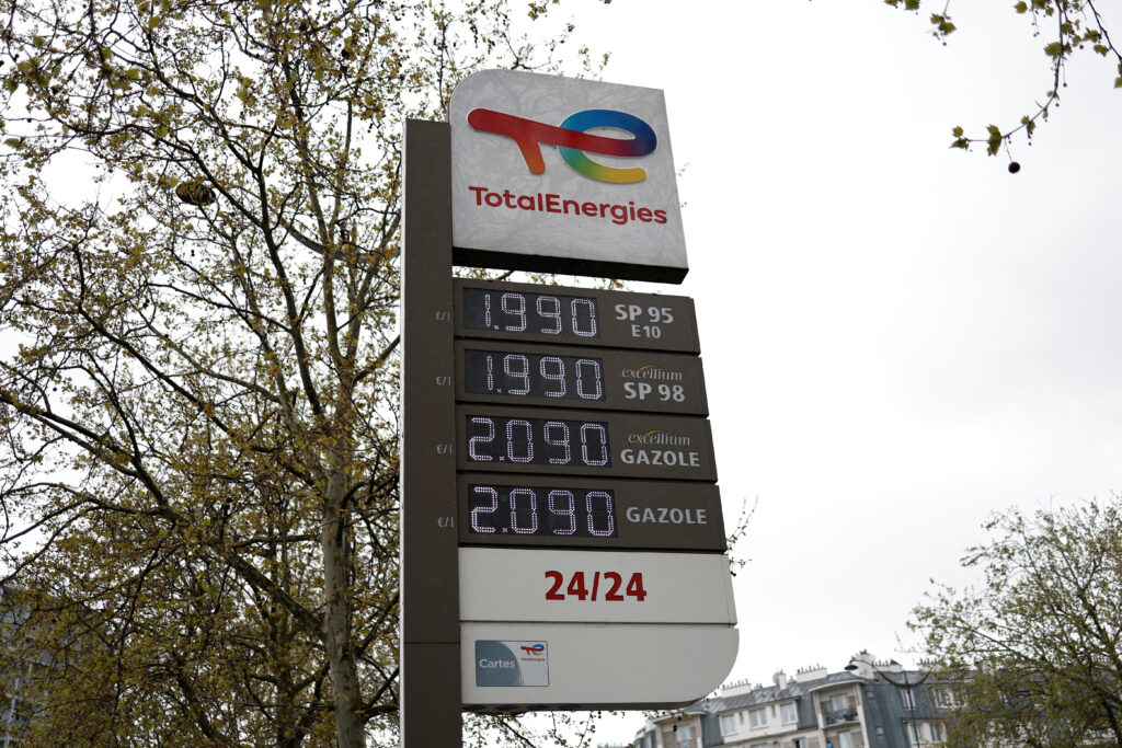 Fuel price signs at a TotalEnergies gas station in Paris