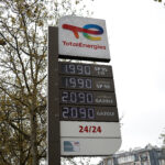 Fuel price signs at a TotalEnergies gas station in Paris