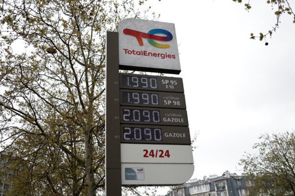 Fuel price signs at a TotalEnergies gas station in Paris