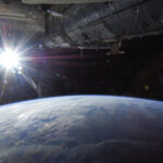 FILE PHOTO: The sun is captured over Earth’s horizon by one of the Expedition 36 crew members aboard the International Space Station