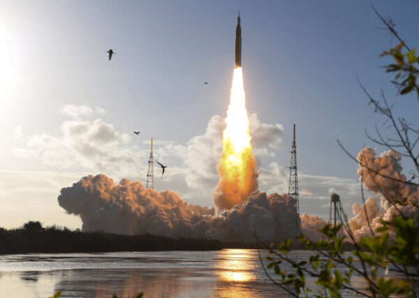 NASA’s Artemis II mission to fly by the moon, comprising of the Space Launch System (SLS) rocket with the Orion crew capsule, lifts off