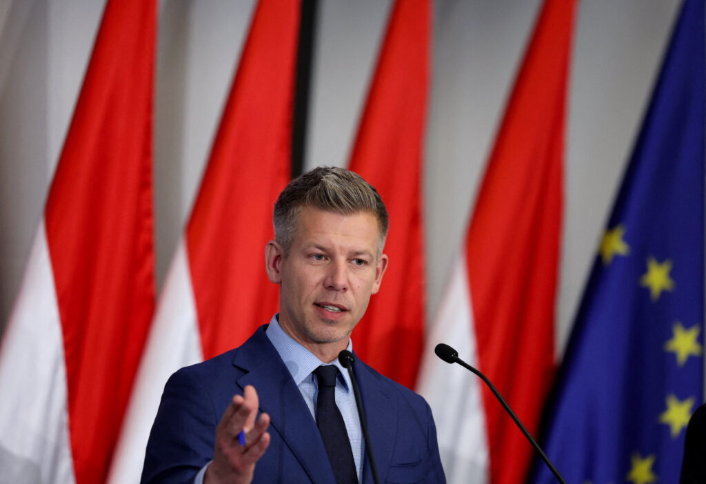 Election winner Magyar speaks during a press conference in Budapest