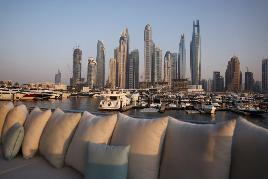 FILE PHOTO: Dubai skyline is seen from a yacht, in Dubai