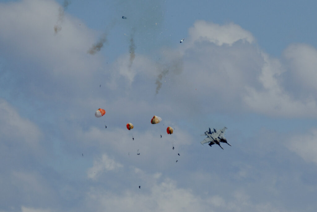 Military jets’ crew members eject safely following a mid-air collision during the Idaho air show outside Mountain Home Air Force Base in Idaho