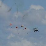 Military jets’ crew members eject safely following a mid-air collision during the Idaho air show outside Mountain Home Air Force Base in Idaho