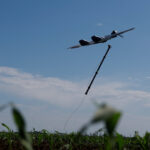 Service members of the 1st Center of Unmanned Aerial Systems launch a middle strike drone in an undisclosed location in Ukraine