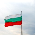 Bulgarian flag against a cloudy sky