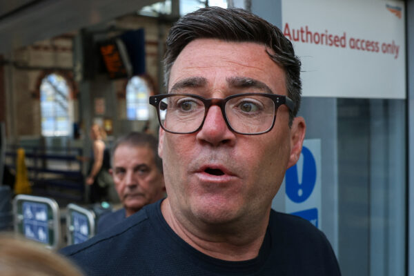 Newly elected Makerfield MP and former Greater Manchester Mayor Andy Burnham at Manchester Piccadilly station as he leaves for London