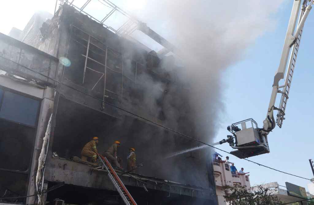 Firefighters douse a deadly fire at a coaching centre in Lucknow