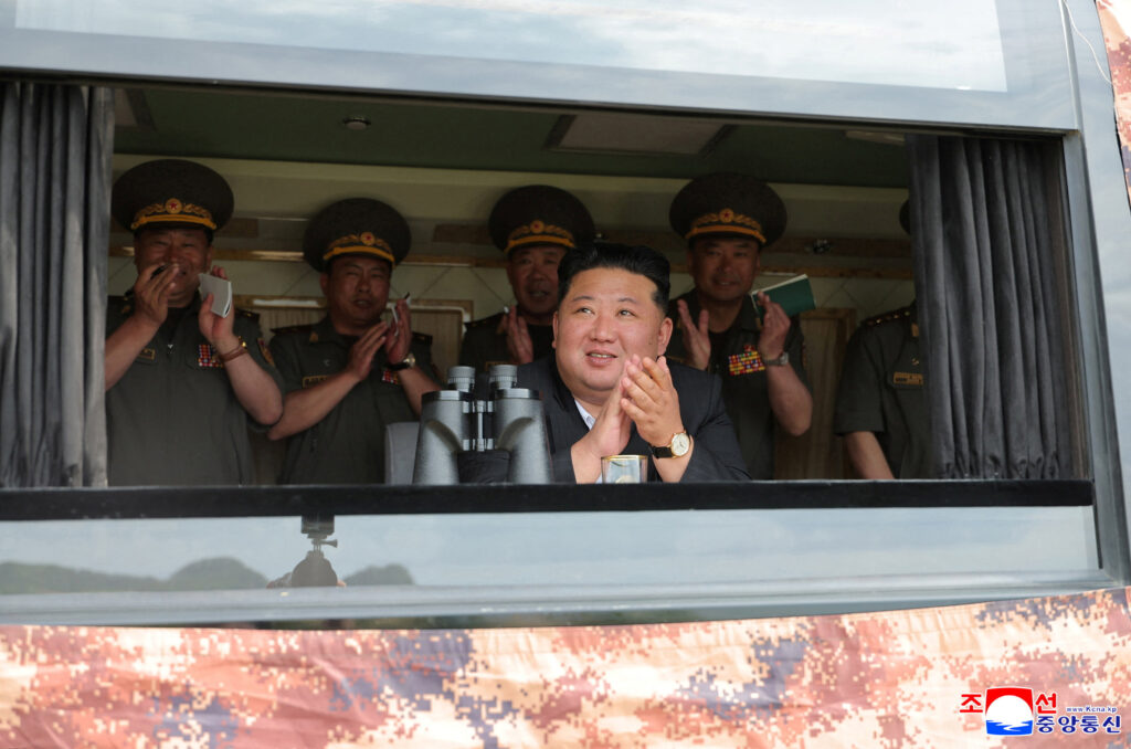North Korean leader Kim oversees weapons tests
