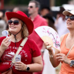 Country music fans on the first day of BST Hyde Park as an amber extreme heat warning remains in place over southeast England