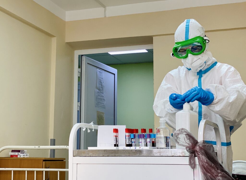 doctor-in-a-protective-medical-suit-and-mask-works-2026-03-18-13-50-27-utc