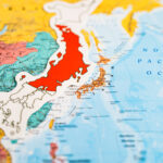 Bangkok, Thailand – September 20, 2021 Japan flag on world map b