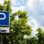 Parking roadsign outdoors, car storage