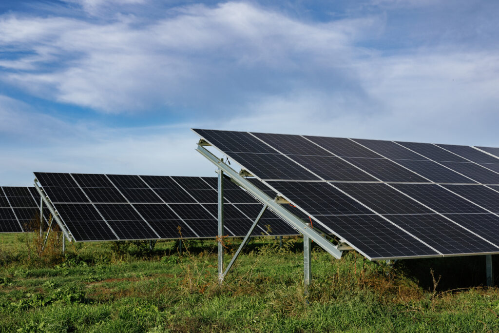 Solar panels providing clean energy under a cloudy sky
