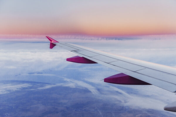 Wing aircraft and a view of cumulus clouds
