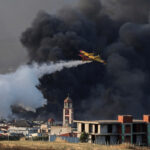 Wildfire burns factory and threaten houses in Oreakastro, north of Thassaloniki, Greece
