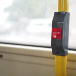 Closeup of Bus bell switch for stop inside the public bus