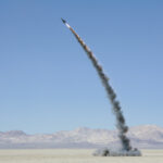 Rocket shooting into vast, desert sky, Black Rock Desert, Nevada,Rocket shooting into vast, desert sky, Black Rock Desert, Nevada,USA
