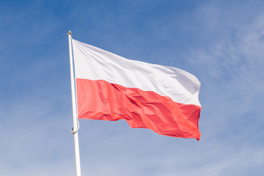 the-national-flag-of-poland-waving-in-a-clear-blue-2026-06-05-04-48-16-utc