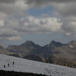 FILE PHOTO: People walk on the slope of Mount Elbrus in the Republic of Kabardino-Balkaria