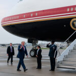 U.S. President Donald Trump boards Air Force One, en route to Joint Base Andrews, in Cleveland