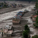 A drove view of damaged properties following a flash flood at Trishuli, Nepal