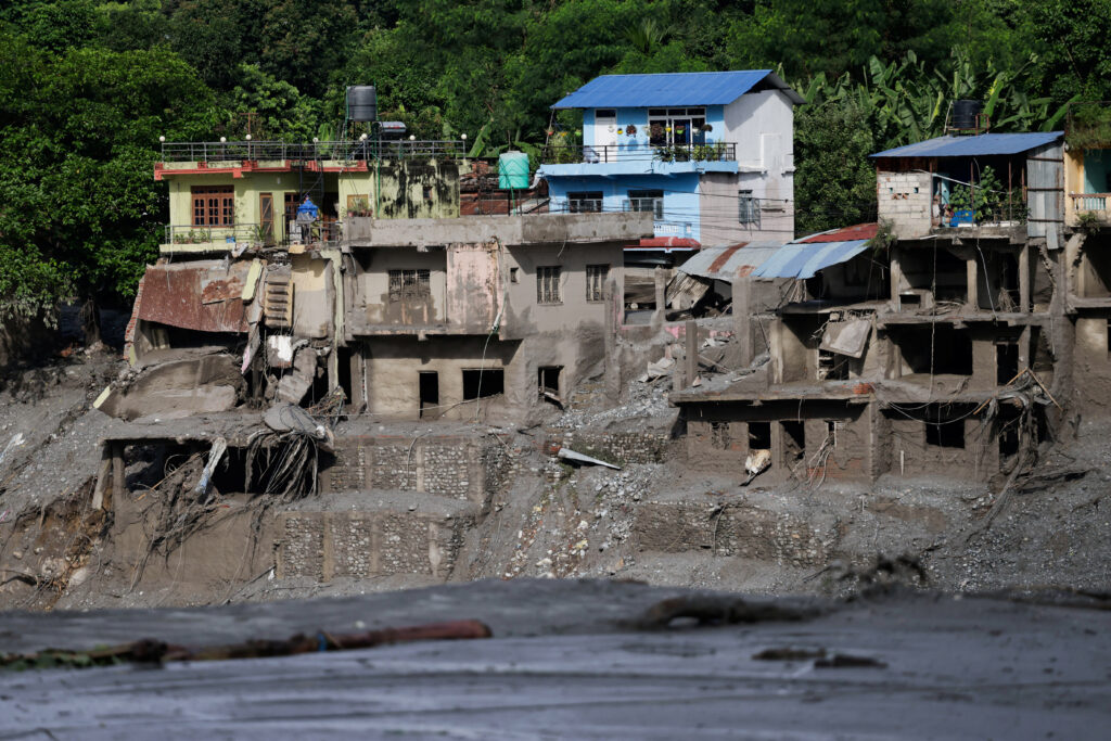 Damaged houses following devastating floods, in Trishuli
