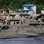 Damaged houses following devastating floods, in Trishuli
