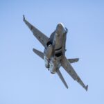 jet-aircraft-soaring-through-a-blue-sky-2026-03-20-00-19-41-utc (1)