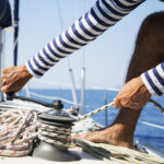 Man in action of pulling rope