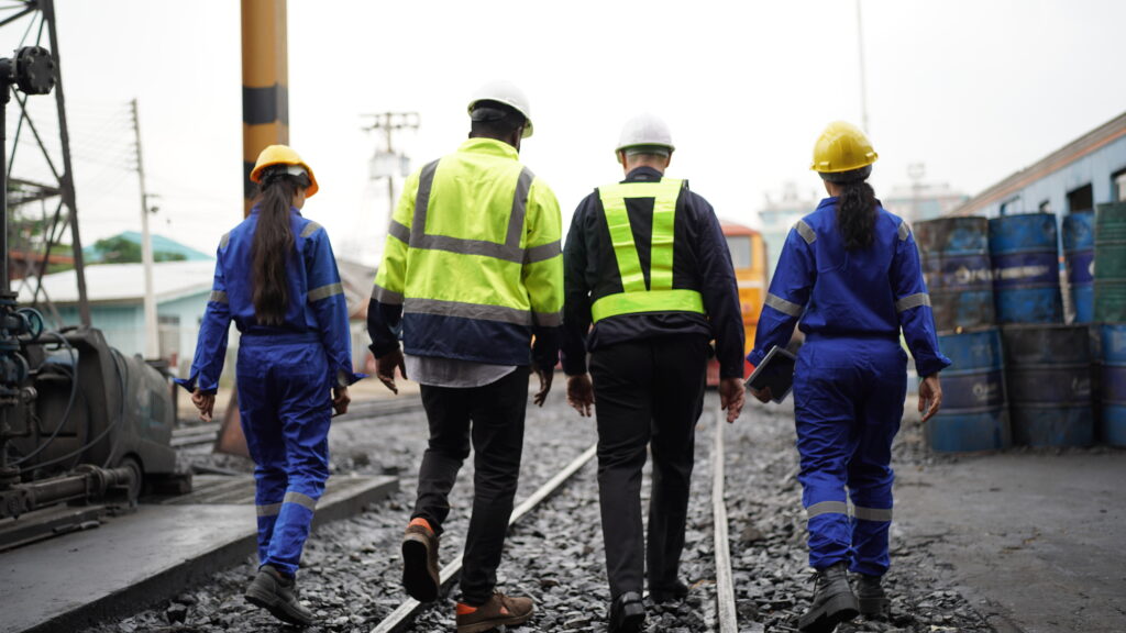 Group of engineer and workers at railway.Transportation facility industry business.