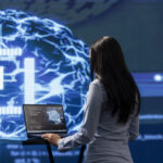 Admin using laptop to maintenance artificial intelligence neural networks