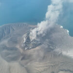 A drone view shows Mount Anak Krakatau volcano spewing hot ash during an eruption in South Lampung