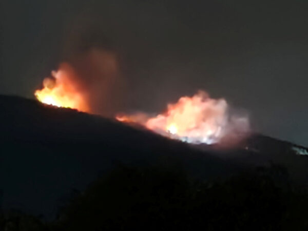 Fire and smoke rise near an ammunition warehouse, near the village of Tsareva Livada